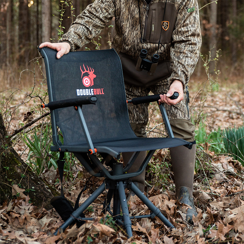 Man setting up Double Bull Chair